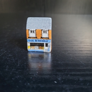 Fingerhut aus Porzellan in Hausform